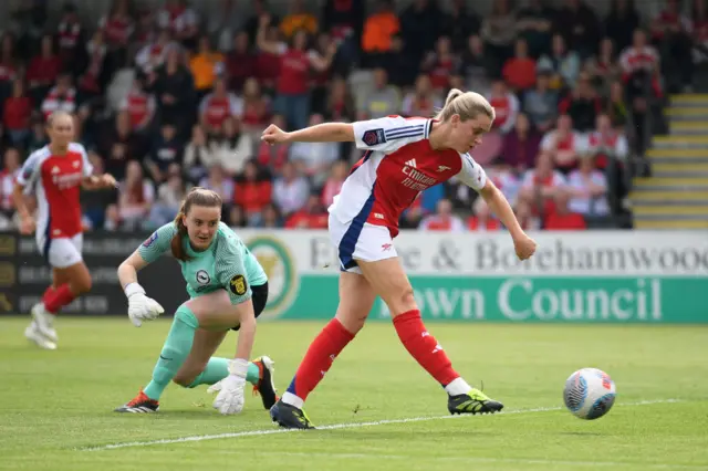 Alessia Russo of Arsenal scores her team's second goal as Sophie Baggaley of Brighton & Hove Albion looks on after failing to make a save during the Barclays Women´s Super League match between Arsenal FC and Brighton & Hove Albion