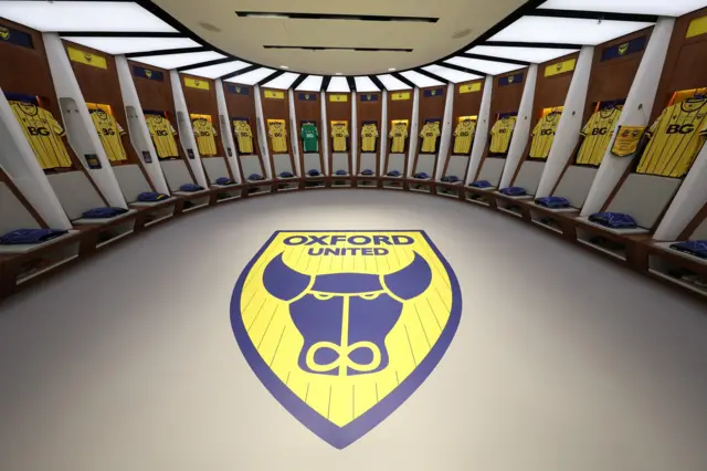 Oxford United crest and shirts in Wembley dressing room