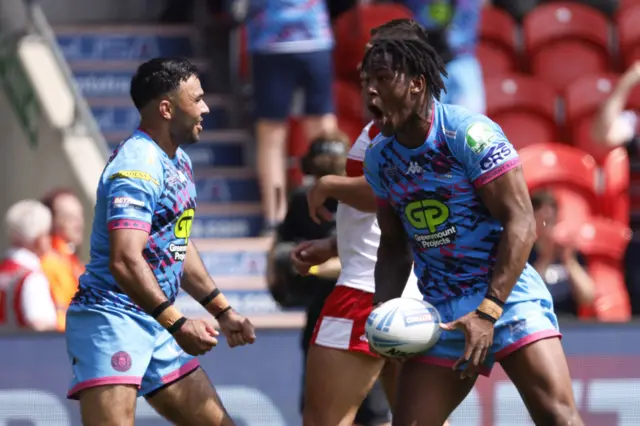 Junior Nsemba celebrates his try