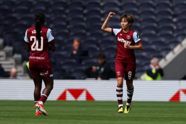 Riko Ueki of West Ham United celebrates scoring her team's first goal during the Barclays Women's Super League match between Tottenham Hotspur and West Ham United at Tottenham Hotspur Stadium