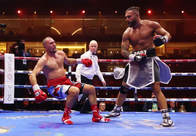 Safar knocks down Kovalev in the final seconds