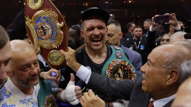 Oleksandr Usyk cries in the ring