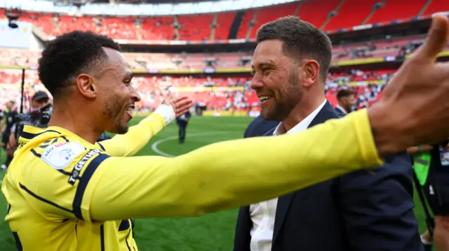 Oxford goalscorer Josh Murphy and manager Des Buckingham