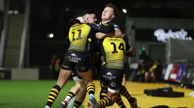 Dragons celebrate Rio Dyer try against Ospreys