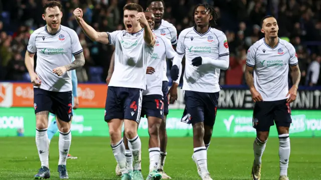 Bolton players celebrate