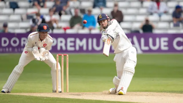 Ed Barnard hitting the ball