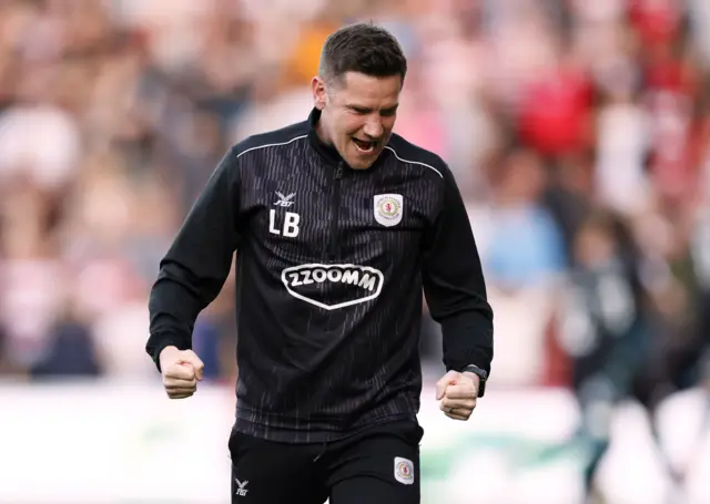 Crewe boss Lee Bell celebrates during the play-off semi-final against Doncaster