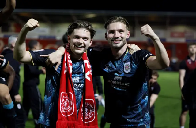 Crewe players celebrate their play-off semi-final win over Doncaster