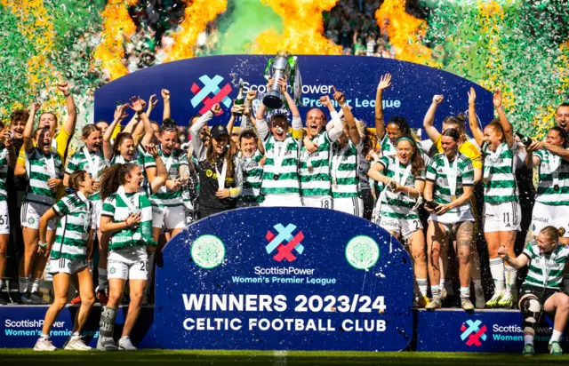 Celtic Captain Kelly Clark lifts the SWPL Trophy during a Scottish Power Women's Premier League match between Celtic and Hibernian at Celtic Park, on May 19, 2024, in Glasgow, Scotland.