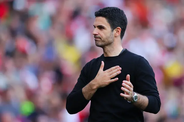 Mikel Arteta, manager of Arsenal, acknowledges the home support