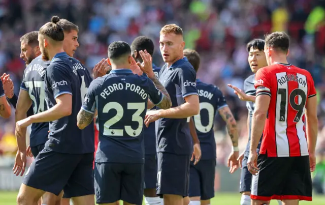 Tottenham Hotspur's Dejan Kulusevski celebrates scoring the opening goal with teammates during the Premier League match between Sheffield United and Tottenham Hotspur at Bramall Lane on May 19, 2024 in Sheffield