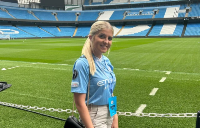 Manchester City fan Liv Lang pitch side at the Etihad