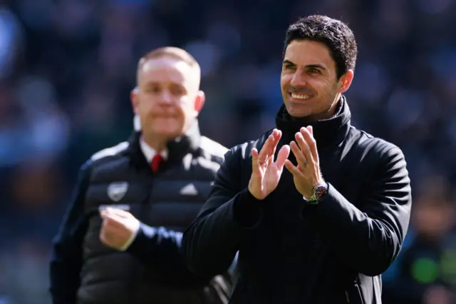 Mikel Arteta smiles