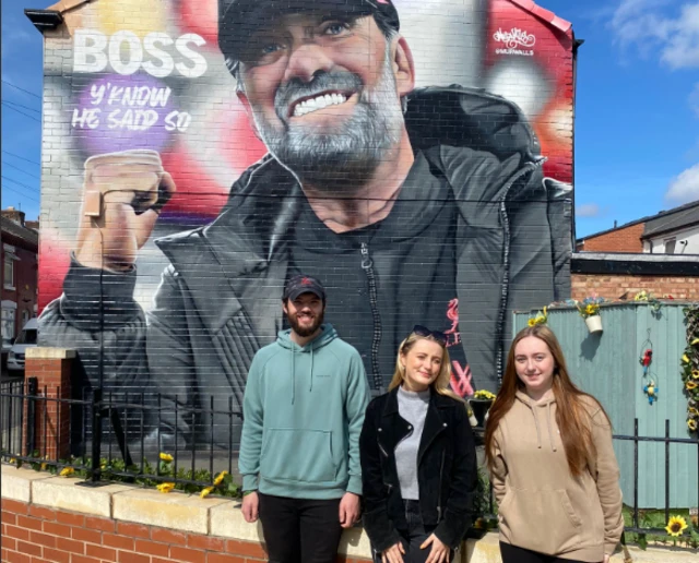 Jurgen Klopp mural near Anfield with Liverpool fans