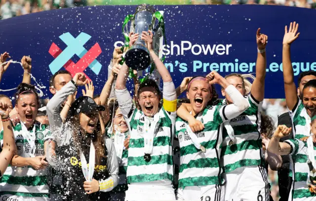 Celtic Captain Kelly Clark lifts the SWPL Trophy during a Scottish Power Women's Premier League match between Celtic and Hibernian at Celtic Park, on May 19, 2024, in Glasgow, Scotland.