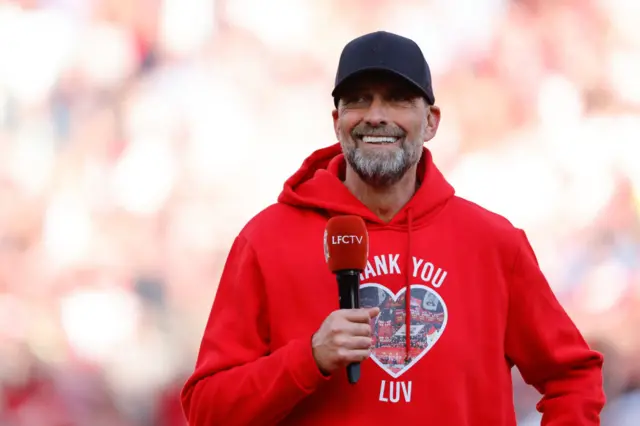 Jurgen Klopp the head coach / manager of Liverpool speaks to the Liverpool fans at full time after the Premier League match between Liverpool FC and Wolverhampton Wanderers