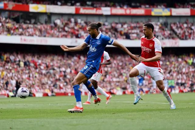 Dominic Calvert-Lewin (L) with a chance on goal during the Premier League match between Arsenal FC and Everton FC at Emirates Stadium