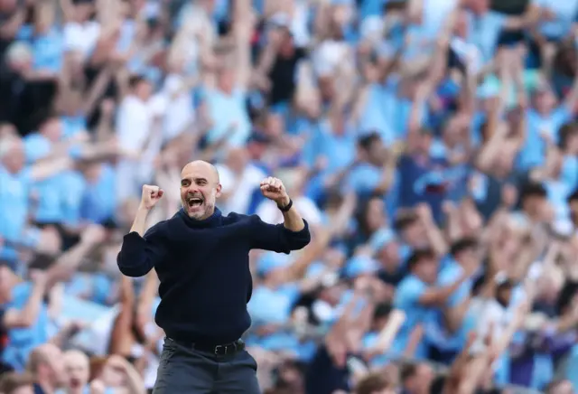 Pep Guardiola, Manager of Manchester City, celebrates after Rodri of Manchester City (not pictured) scores his team's third goal during the Premier League match between Manchester City and West Ham United