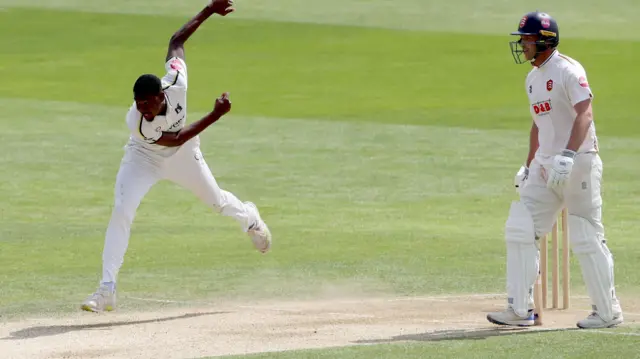 Che Simmons bowling for Warwickshire