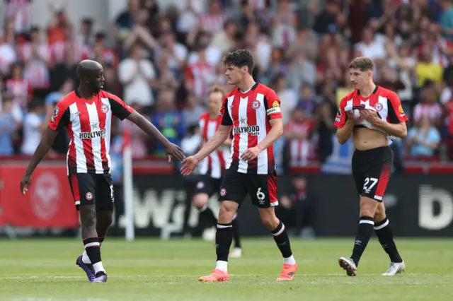 Yoane Wissa of Brentford celebrates scoring his team's second goal with teammate Christian Norgaard during the Premier League match between Brentford FC and Newcastle United at Brentford Community Stadium