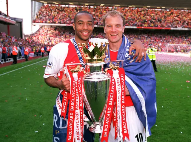 Thierry Henry and Dennis Bergkamp with Premier League title