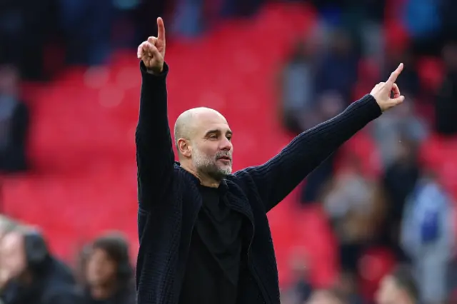 Pep Guardiola celebrates