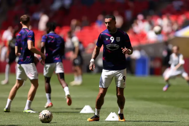 Crewe players warm up before the League Two play-off final