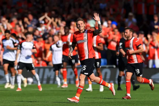 Alfie Doughty of Luton Town celebrates scoring their second goal during the Premier League match between Luton Town and Fulham FC at Kenilworth Road