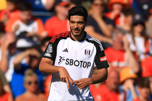 Raul Jimenez of Fulham celebrates scoring their third goal during the Premier League match between Luton Town and Fulham FC at Kenilworth Road