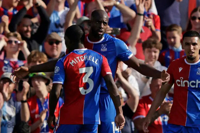 Crystal Palace's French striker #14 Jean-Philippe Mateta (C) celebrates with teammates after scoring his third goal, Palace's fourth during the English Premier League football match between Crystal Palace and Aston Villa at Selhurst Park