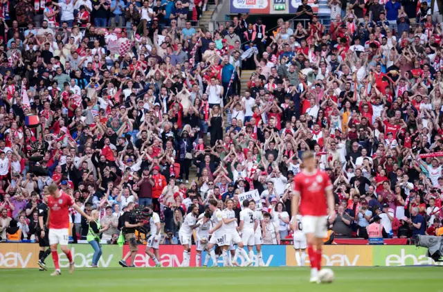 Crawley and their fans celebrate going 2-0 up against Crewe