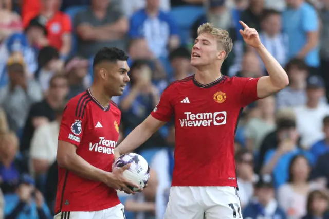 : Rasmus Hojlund of Manchester United celebrates scoring his team's second goal during the Premier League match between Brighton & Hove Albion and Manchester United at American Express Community Stadium