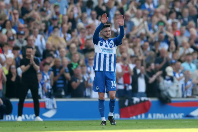 Adam Lallana of Brighton & Hove Albion acknowledges the fans as he is substituted during the Premier League match between Brighton & Hove Albion and Manchester United at American Express Community Stadium