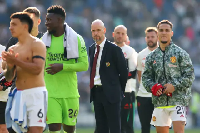 Erik ten Hag, Manager of Manchester United, looks on after the team's victory in the Premier League match between Brighton & Hove Albion and Manchester United at American Express Community Stadium