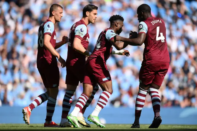 Mohammed Kudus of West Ham United celebrates scoring his team's first goal with teammates Tomas Soucek, Konstantinos Mavropanos and during the Premier League match between Manchester City and West Ham United at Etihad Stadium