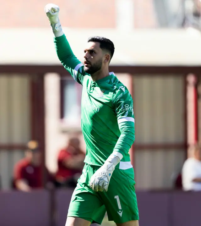 St Johnstone's Dimitar Mitov celebrates after Nicky Clark (not in frame) scored to make it 1-0 during a cinch Premiership match between Motherwell and St Johnstone at Fir Park