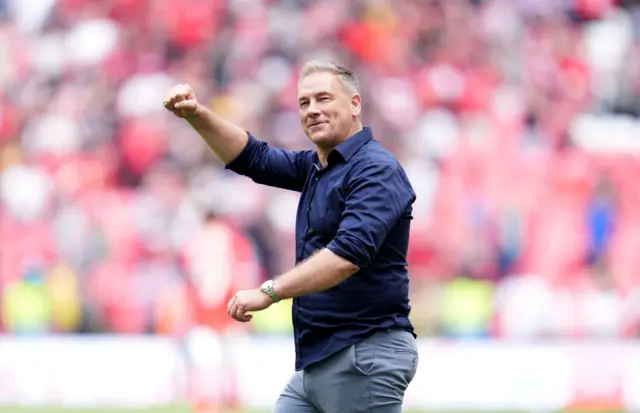 Crawley boss Scott Lindsey celebrates winning promotion