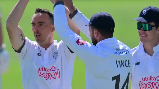 Kyle Abbott celebrates taking a wicket