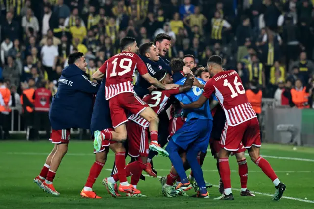 Olympiacos players celebrate