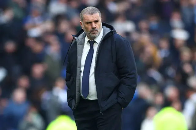 Ange Postecoglou, Manager of Tottenham Hotspur, looks dejected after the team's defeat during the Premier League match between Tottenham Hotspur and Arsenal FC