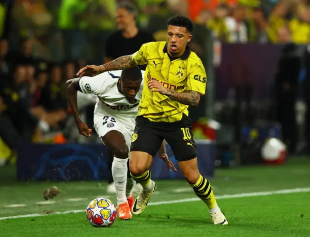 Jadon Sancho playing against Paris St-Germain