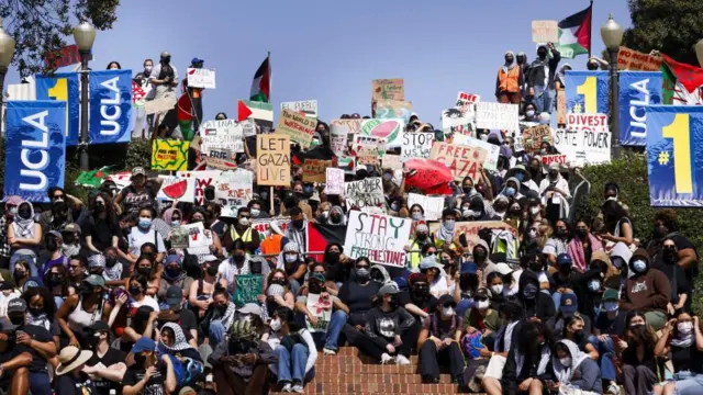 People gather in support of the encampment of pro-Palestinian protesters on the campus of University of California Los Angeles (UCLA)