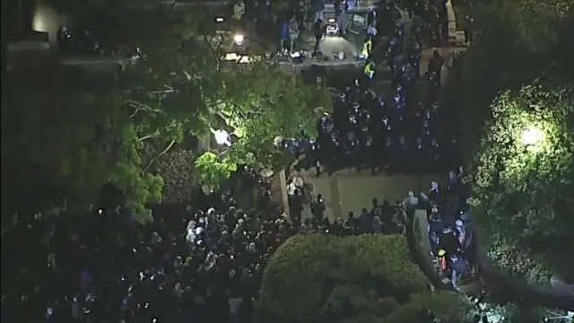 CHP policemen at the top of the image face off with pro-Palestinian protesters