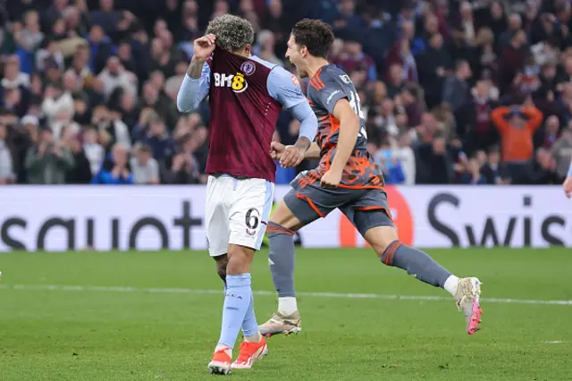 Douglas Luiz of Aston Villa reacts after missing a penalty