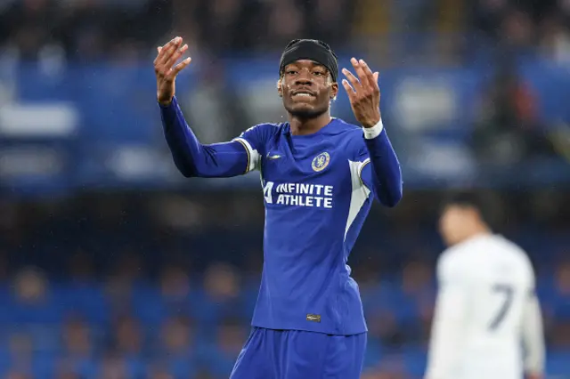 Noni Madueke of Chelsea after team-mate Trevoh Chalobah scores a goal to make it 1-0 during the Premier League match between Chelsea FC and Tottenham Hotspur