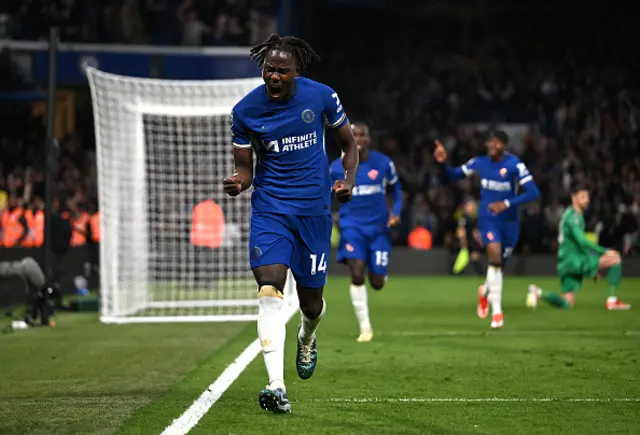 Trevoh Chalobah of Chelsea celebrates scoring his team's first goal during the Premier League match between Chelsea FC and Tottenham Hotspur at Stamford Bridge