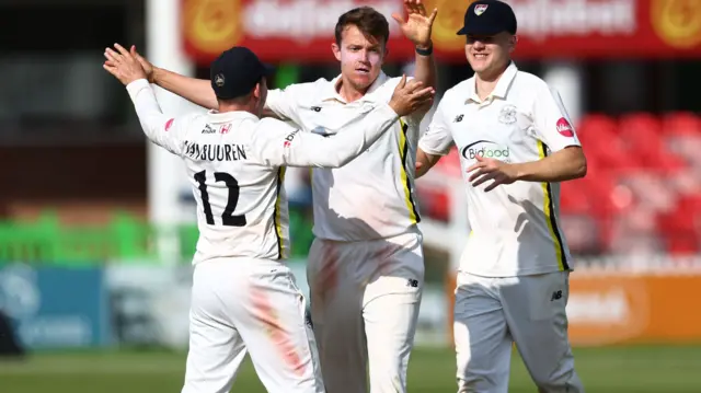 Josh Shaw celebrates taking wicket