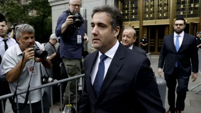 Cohen leaves federal court in May 2018, a week after the FBI raided his home.