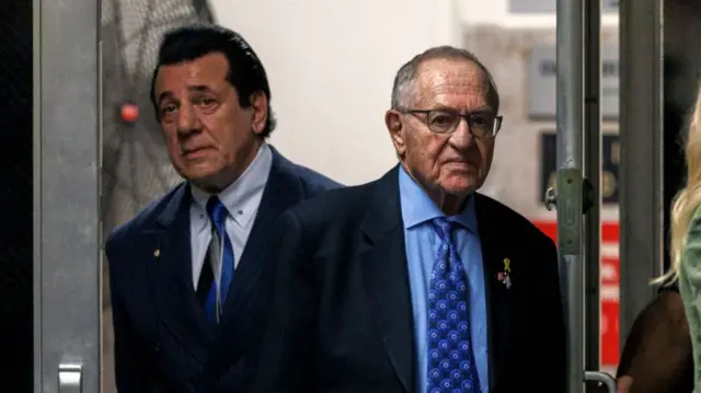 Chuck Zito and Alan Dershowitz entering court