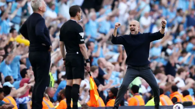 Pep Guardiola celebrates